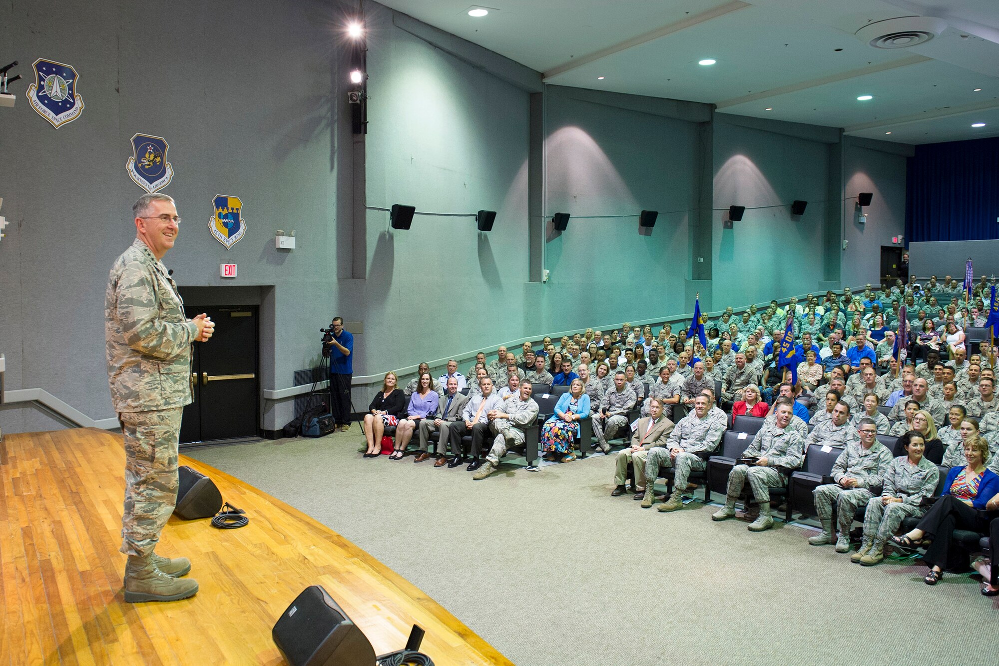Gen. John Hyten, commander, Air Force Space Command, speaks to the members of Patrick Air Force Base and Cape Canaveral Air Force Station July 14, 2015, at the Base Theater. During his comments, Hyten emphasized his three priorities – win today’s fight, prepare for tomorrow’s fight and take care of Airmen. (U.S. Air Force photo/Matthew Jurgens) (Released)