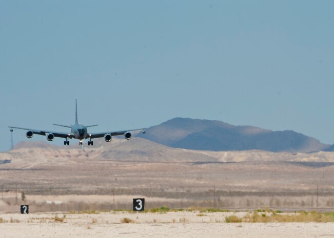 A KC-135 Stratotanker assigned to the 22nd Air Refueling Wing, McConnell Air Force Base, Kan., prepares to land on the runway after returning from a Red Flag 15-3 sortie at Nellis AFB, Nev., July 17, 2015. Red Flag involves a variety of attack, fighter, bomber, reconnaissance, electronic warfare, airlift support and search and rescue aircraft. (U.S. Air Force photo by Airman 1st Class Jake Carter)