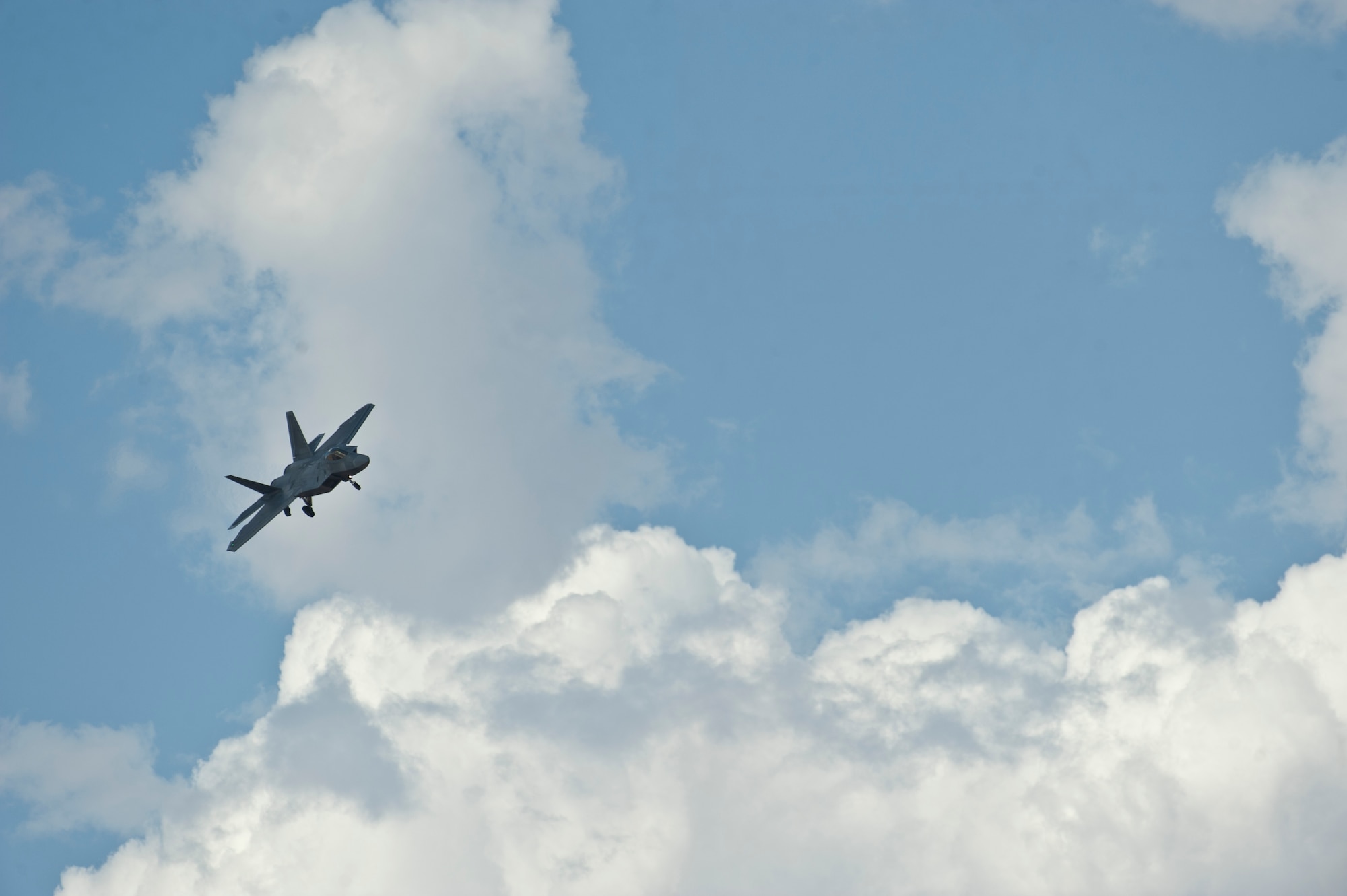 An F-22 Raptor assigned to the 95th Fighter Squadron, Tyndall Air Force Base, Fla., flies during a Red Flag 15-3 sortie at Nellis AFB, Nev., July 17, 2015. The F-22's characteristics provide a synergistic effect ensuring F-22 lethality against all advanced air threats. (U.S. Air Force photo by Staff Sgt. Siuta B. Ika)