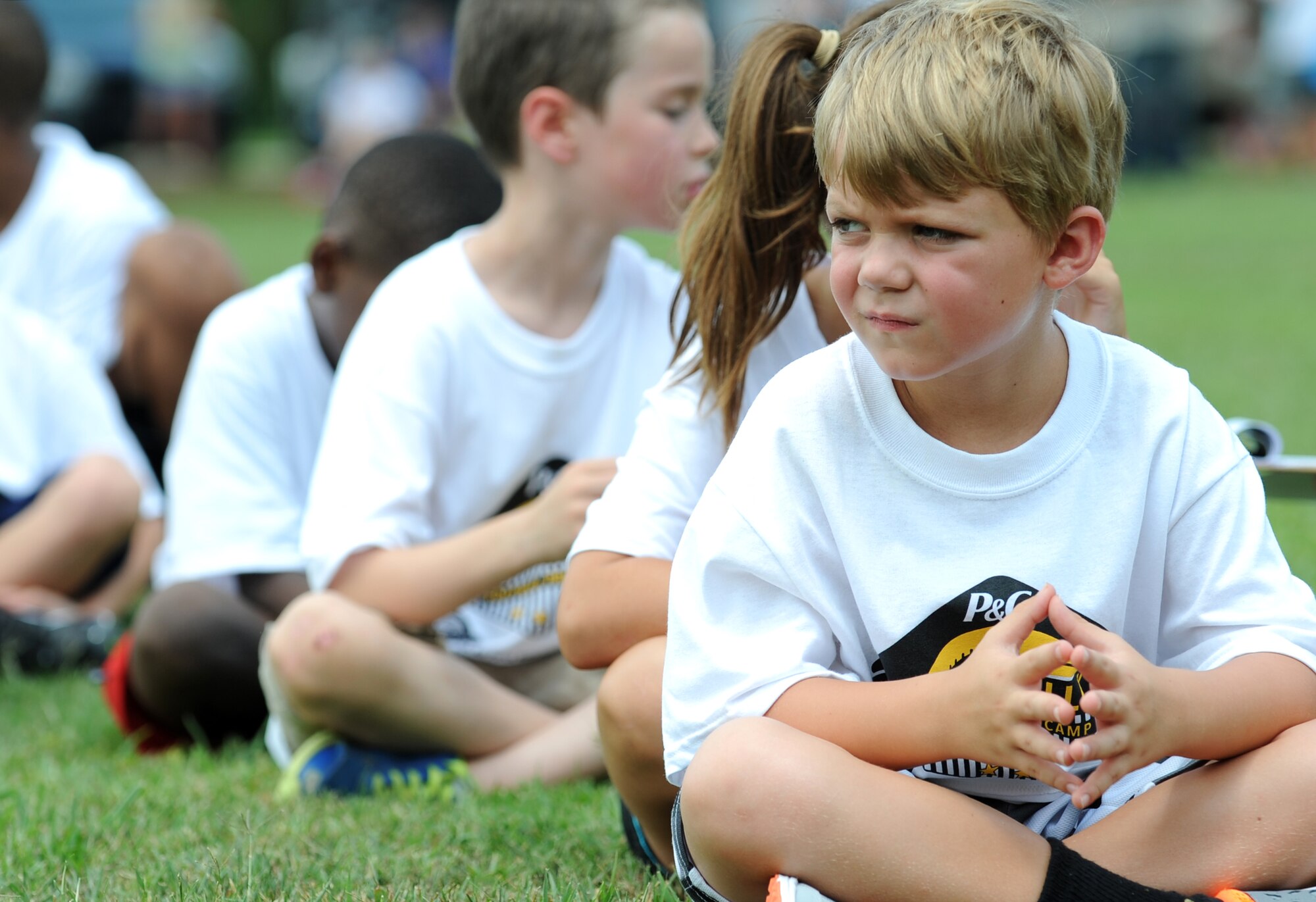 A National Football League ProCamp athlete puts on his game face, July 16, 2015, at Seymour Johnson Air Force Base, North Carolina. Children in grades one through eight spent two days cycling through drills and learning the value of teamwork and leadership. (U.S. Air Force photo/Senior Airman Ashley J. Thum)