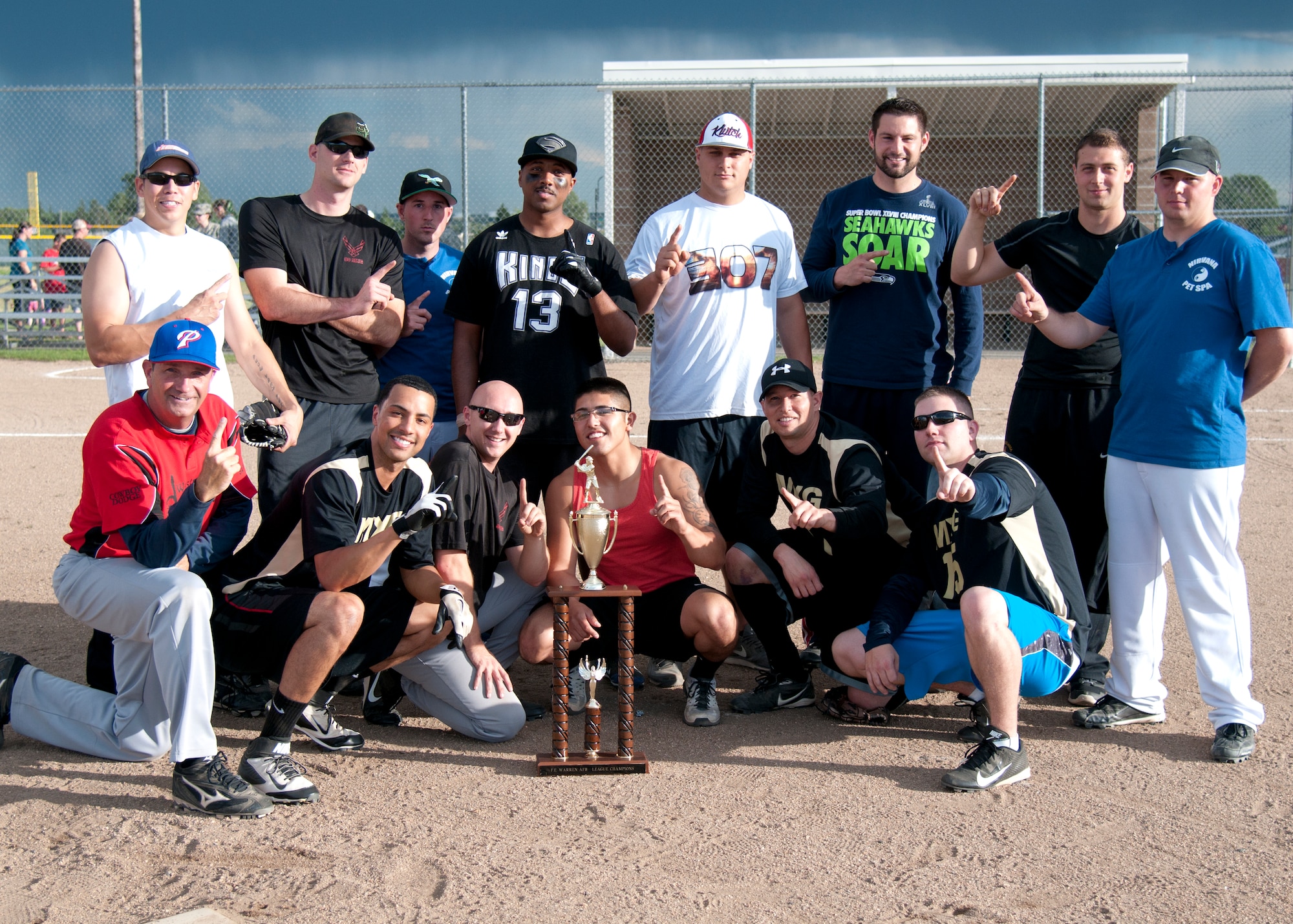 The 90th Maintenance Group intramural softball team poses after wining the championship game, July 16, 2015 on F.E. Warren Air Force Base, Wyo. This is the teams second consecutive win. (U.S. Air Force photo by Airman 1st Class Malcolm Mayfield)
