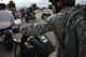 Participants line up July 1, 2015 in the parking lot of the Base Exchange at Dyess Air Force Base, Texas. Riders gathered for a motorcycle safety course sponsored by Dyess, the Abilene Police Department and international motorcycle group, the Green Knights. The temporary track that accompanied the course was designed for participants to practice the safe handling techniques they had learned earlier in the event. (U.S. Air Force photo by Senior Airman Alexander Guerrero/Released)