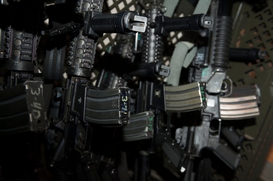 M4 rifles rest against a gun rack in the security control center at Bravo-01 Missile Alert Facility near Ruso, N.D., July 1, 2015. Weapons that are not being carried by patrols are stored in the security control center under the watch of flight security controllers. (U.S. Air Force photo/Senior Airman Stephanie Morris) 