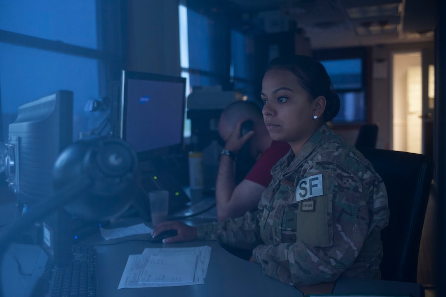 Senior Airman Jessica Flores, 91st Missile Security Forces Squadron flight security controller, reviews a roster at Bravo-01 Missile Alert Facility near Ruso, N.D., July 1, 2015. FSCs are charged with controlling access to all launch facilities, MAFs and the security control center within their assigned flight area. (U.S. Air Force photo/Senior Airman Stephanie Morris) 