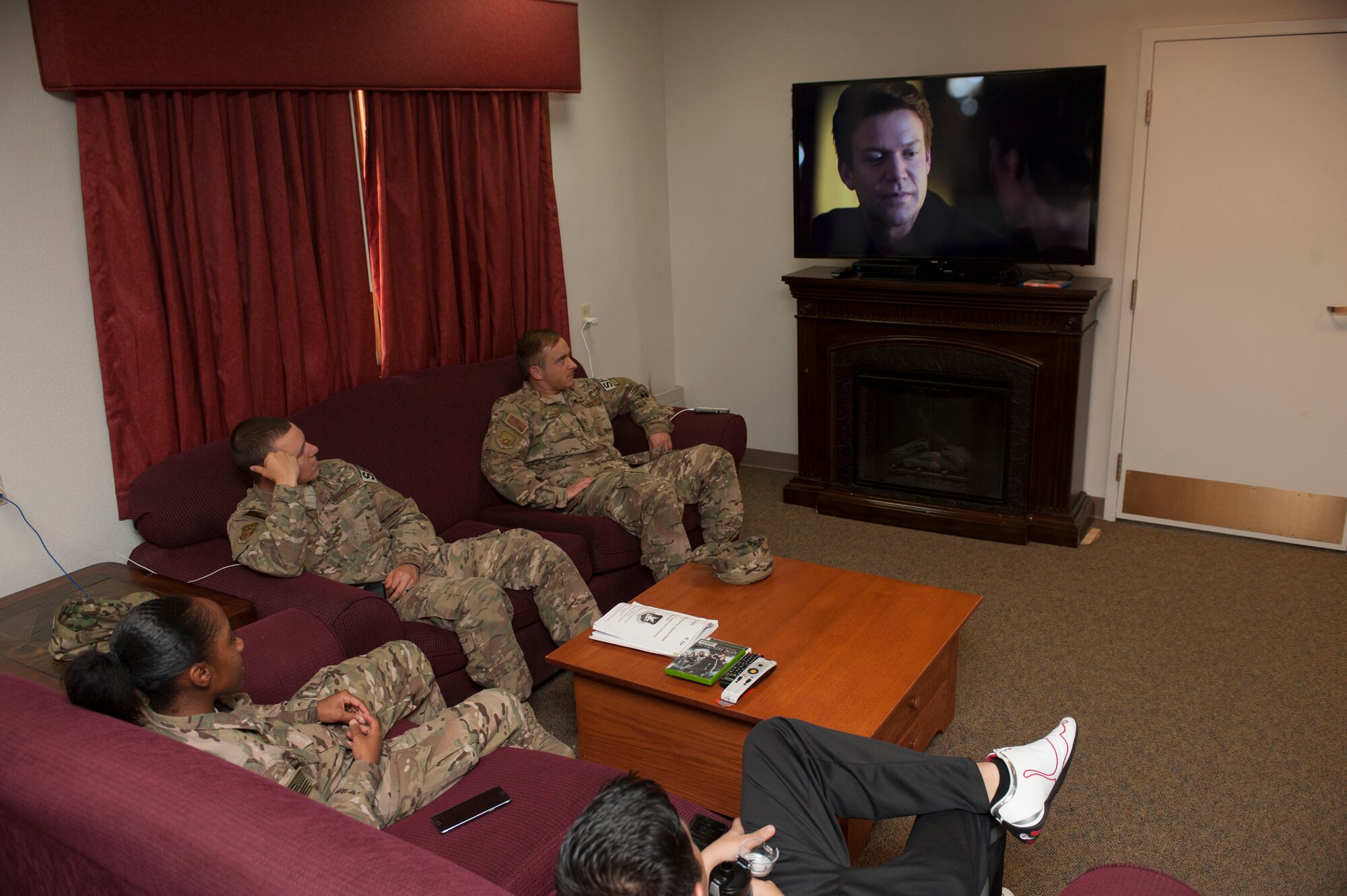 Airmen from the 91st Missile Security Forces Squadron wind down at the Bravo-01 Missile Alert Facility near Ruso, N.D., July 1, 2015. 91st MSFS members work twelve-hour shifts day and night, and are in the field for four days. As such, they spend both their work time and downtime at the MAF. (U.S. Air Force photo/Senior Airman Stephanie Morris)