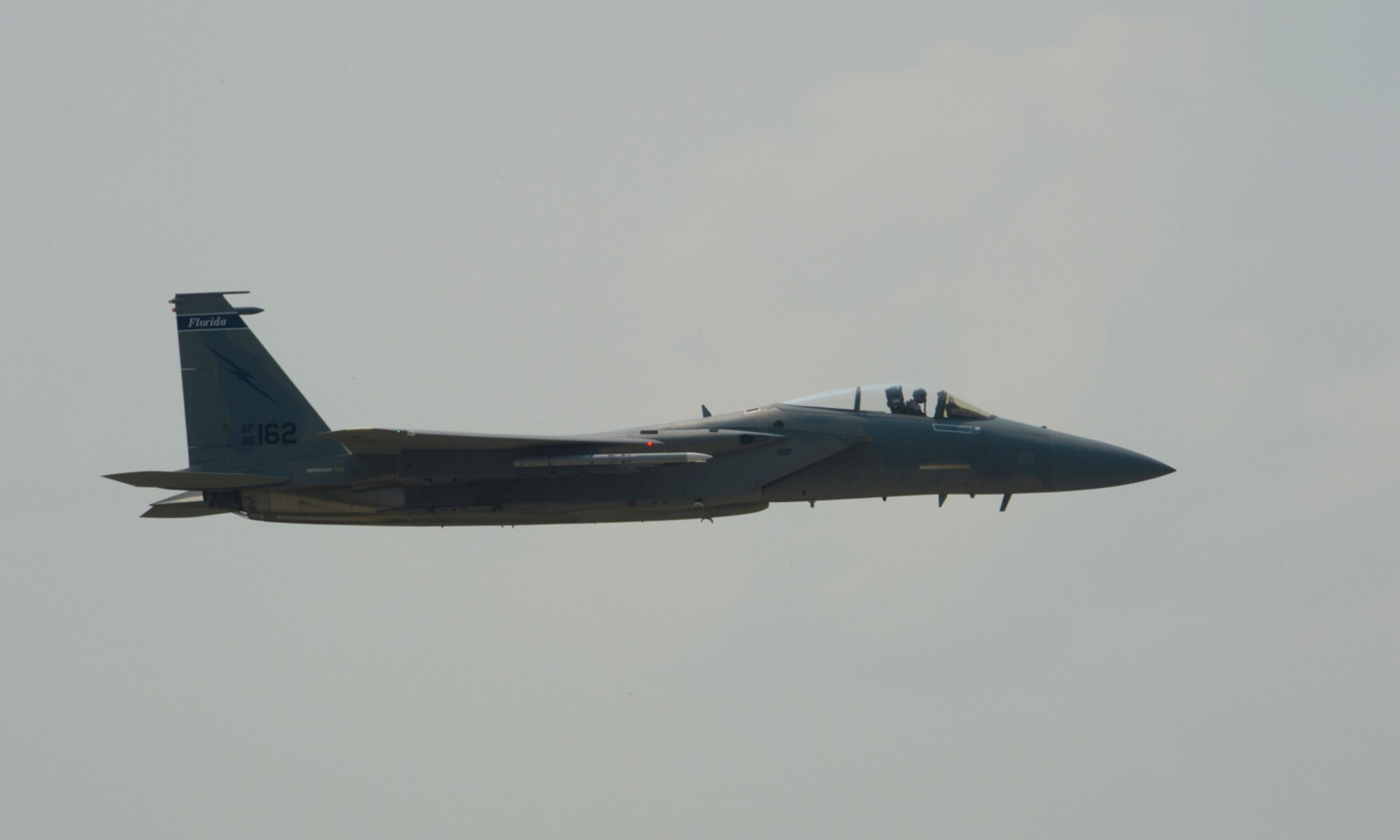 A U.S. Air National Guard F-15C Eagle fighter aircraft assigned to the 123rd Expeditionary Fighter Squadron flies over the flightline during the 2015 Campia Turzii Air Show July 19, 2015, at Campia Turzii, Romania. The aircraft deployed to Romania in support of Operation Atlantic Resolve to bolster air power capabilities while underscoring the U.S.’s commitment to European security and stability. (U.S. Air Force photo by Senior Airman Dylan Nuckolls/Released)