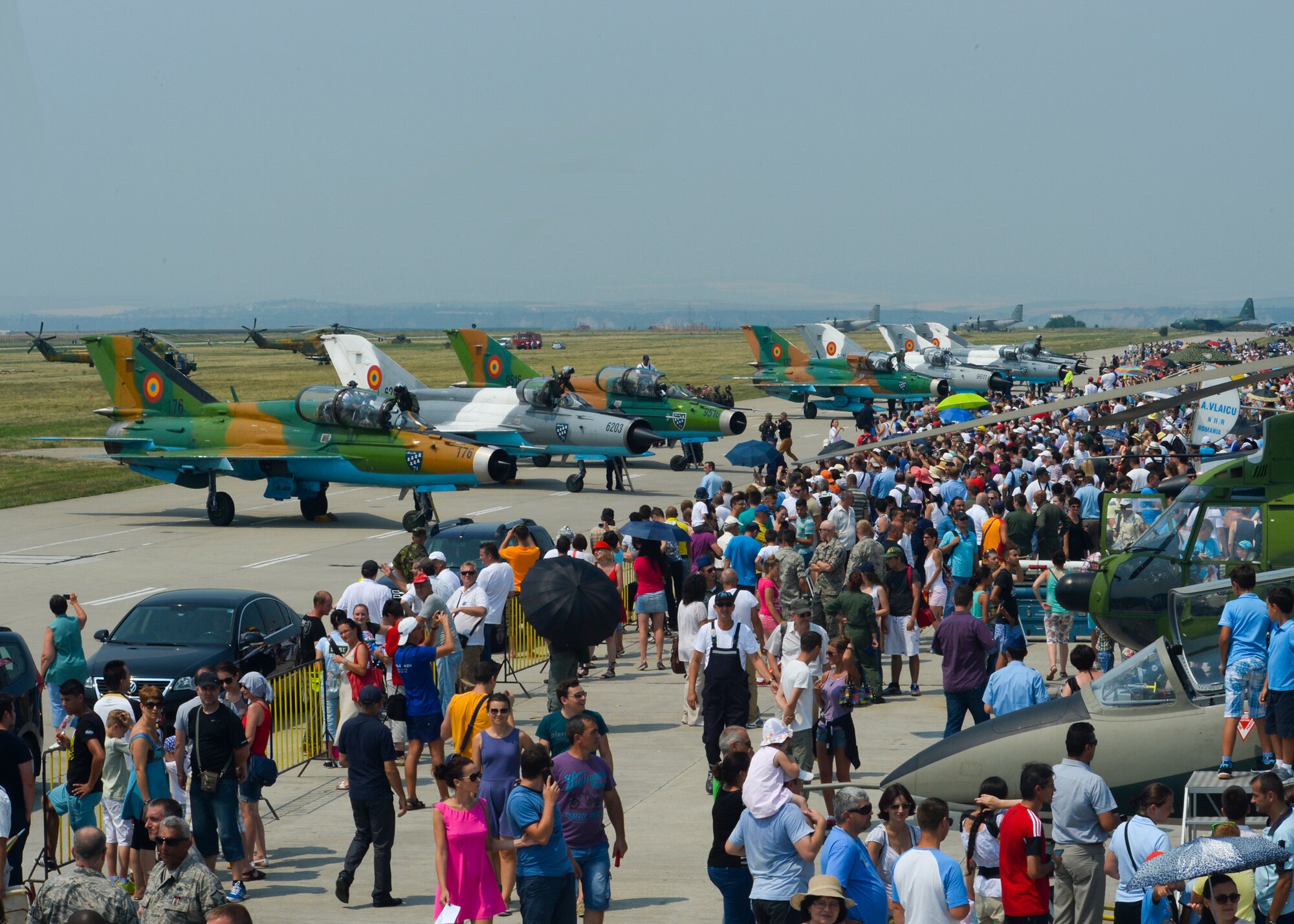 Thousands of spectators watch the 2015 Campia Turzii Air Show July 19, 2015, at Campia Turzii, Romania. The air show celebrated the Romanian air force’s birthday and featured static displays of aircraft, tanks and military equipment. (U.S. Air Force photo by Senior Airman Dylan Nuckolls/Released)