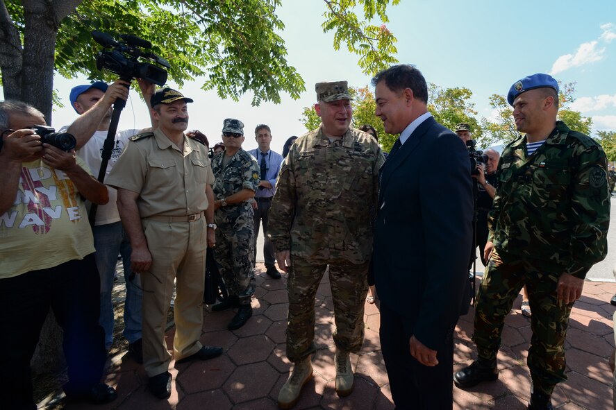 U.S. Army Maj. Gen. Terry M. Haston, the adjutant general for Tennessee, greets Nikolay Nankov Nenchev, Republic of Bulgaria minister of defense, at Krumuvo Air Base, July 16, 2015. Nenchev met with U.S. and Bulgarian leaders during his visit, as well as watched a multinational air show. The U.S. values the shared commitment and close cooperation with NATO partners on countering a range of regional and global threats. (U.S. Air Force photo/Senior Airman Nicole Sikorski)