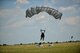 A Bulgarian air force paratrooper lands after an airdrop at Krumuvo Air Base, Bulgaria, July 16, 2015. U.S. and Bulgarian forces performed daily airdrops during a two-week-long bilateral training exercise over Plovdiv, Bulgaria. More than 100 service members from Ramstein Air Base, Germany deployed to Plovdiv for the bilateral NATO exercise, to enhance joint readiness while building interoperability capabilities. (U.S. Air Force photo/Senior Airman Nicole Sikorski)