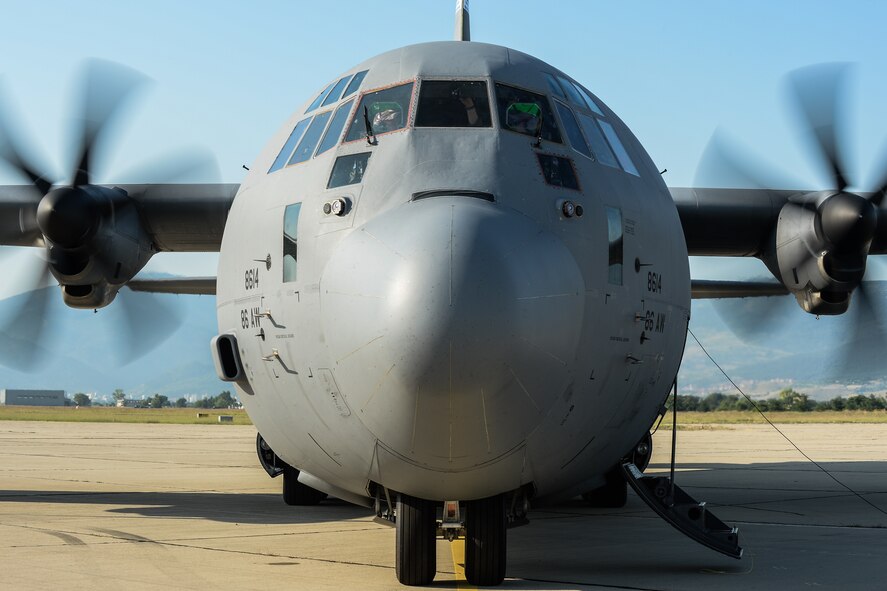 U.S. Air Force Captains Doug Mabe and Brian Shea, 37th Airlift Squadron pilots, start the engine of a C-130J Super Hercules before a U.S. and Bulgarian formation flight July 13, 2015, in Plovdiv, Bulgaria. The flight is the first of many during the week-long training exercise to enhance interoperability, maintain joint readiness and assure regional alliances and partnerships. (U.S. Air Force photo/Senior Airman Nicole Sikorski)