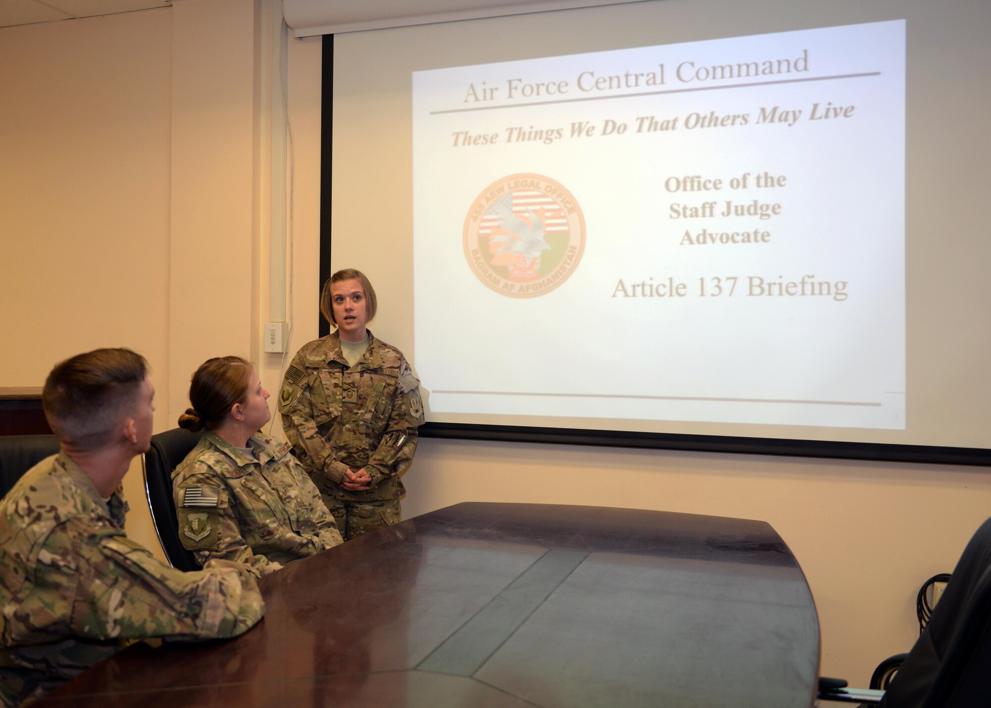 U.S. Air Force Master Sgt. Natasha Hoglund, 455th Air Expeditionary Wing Legal Office superintendent, gives a legal briefing to Airmen July 18, 2015, at Bagram Airfield, Afghanistan. The legal office is here to help military members with legal issues they may be dealing with at home and here in the AOR. (U.S. Air Force photo by Senior Airman Cierra Presentado/Released)