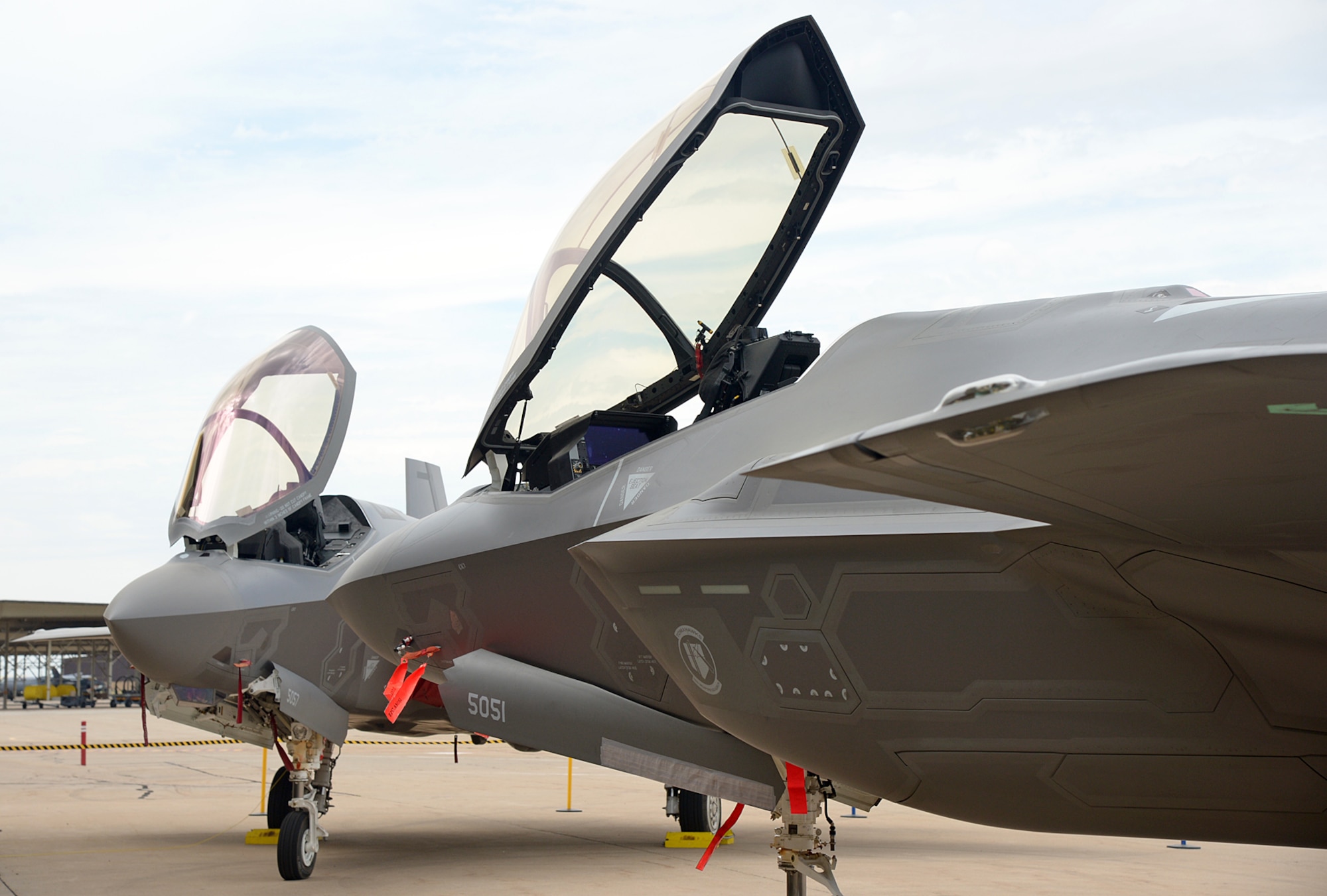 Two F-35A Lightning II aircraft are on static display during the 34th Fighter Squadron’s activation ceremony held July 17 at Hill Air Force Base, Utah. The 34th will be the first combat squadron to fly the Air Force’s newest fighter aircraft, the F-35A. The squadron has an extremely rich history. After many contributions in major U.S. conflicts, the 34th was relocated to Hill AFB on Dec. 8, 1975, where they became the first fighter squadron to receive the F-16 fighter aircraft. The squadron’s first F-35A will arrive in September.  (U.S. Air Force photo by Alex R. Lloyd/Released)