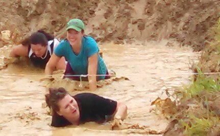 Naval Surface Warfare Center Dahlgren Division (NSWCDD) Systems Safety Engineering Division personnel - known as the "Mud Crazy G70 Team" - ran a challenging four mile-long obstacle course, raising funds for local children, families and residents June 27.