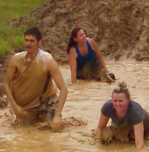 Naval Surface Warfare Center Dahlgren Division (NSWCDD) Systems Safety Engineering Division personnel - known as the "Mud Crazy G70 Team" - ran a challenging four mile-long obstacle course, raising funds for local children, families and residents June 27.