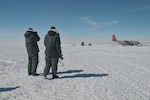 Reporters take photographs of a New York Air National Guard 109th Airlift Wing LC-130 Skibird at Summit, Greenland, on June 29, 2015. Airmen and aircraft from the New York Air National Guard's 109th AW stage out of Kangerlussuaq, Greenland, during the summer months, supplying fuel and supplies and transporting passengers in and out of various National Science Foundation camps on the ice shelf in Greenland throughout the entire season. The unique capabilities of the ski-equipped LC-130 aircraft make it the only one of its kind in the U.S. military, able to land on snow and ice.