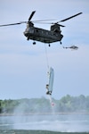 A New York Army National Guard CH-47 based a the Army Aviation Support Facility in Rochester hoists a New York State Park Police out of the Niagara River on Sunday, June 19.