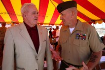 Sgt. Maj. Mike Bolyard, the sergeant major of 2nd Battalion, 4th Marines, 1st Marine Division, speaks to Col. Jim Williams (Ret.), the 2/4 Association liaison, after an award ceremony aboard Marine Corps Base Camp Pendleton, California, July 17, 2015. The 2/4 Association is an organization, which supports active duty, retired and honorably discharged Marines and Sailors and have served with 2/4 through the years.