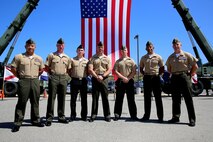 Marines and a Sailor with 2nd Battalion, 4th Marines, 1st Marine Division, pose for a photo after a 2/4 Association ceremony aboard Marine Corps Base Camp Pendleton, California, July 17, 2015. Four Marines and a Sailor were presented with awards by the 2/4 Association liaison, Col. Jim Williams (Ret.).