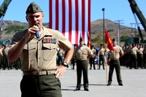 Lt. Col. Brian D. Greene, the commanding officer of 2nd Battalion, 4th Marines, 1st Marine Division, talks to the personnel in attendance during a 2/4 Association award ceremony aboard Marine Corps Base Camp Pendleton, July 17, 2015. After the award recipients posted, Green offered his remarks on the accomplishments of those who serve today and honored the ones who came before.