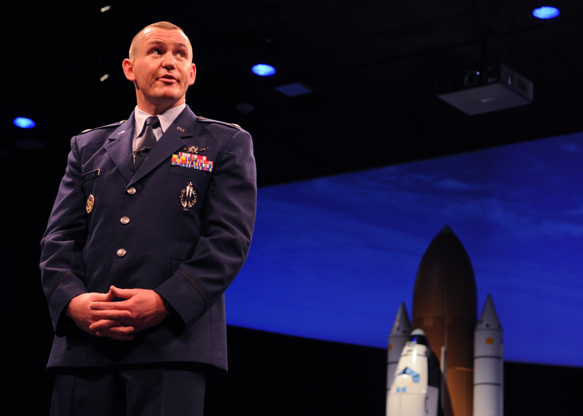 Maj. Benjamin Calhoon, the chief of the Positioning, Navigation and Timing Branch within the Space Operations Division of Headquarters Air Force, gives a GPS lecture at the Smithsonian’s National Air and Space Museum in Washington D.C., July 17, 2015. The Air Force celebrated the 20th anniversary of the GPS. (U.S. Air force photo/Staff Sgt. Whitney Stanfield)