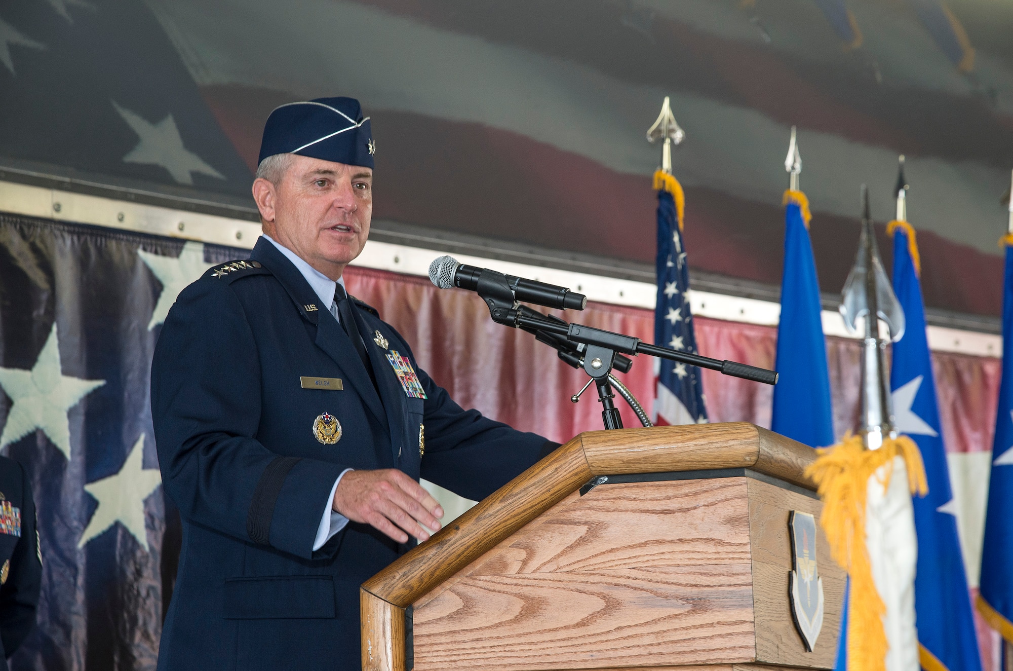 JOINT BASE SAN ANTONIO-RANDOLPH, Texas -- Air Force Chief of Staff Gen. Mark A. Welsh III speaks to attendees during the Air Education and Training Command change of command ceremony at Joint Base San Antonio-Randolph, Texas, July 21, 2015. Air Education and Training Command includes more than 60,000 active duty, Air Reserve component members and civilian personnel and 1,300 aircraft. The mission of AETC is to recruit, train and educate Airmen to deliver Air Power for America. (U.S. Air Force photo by Johnny Saldivar) 