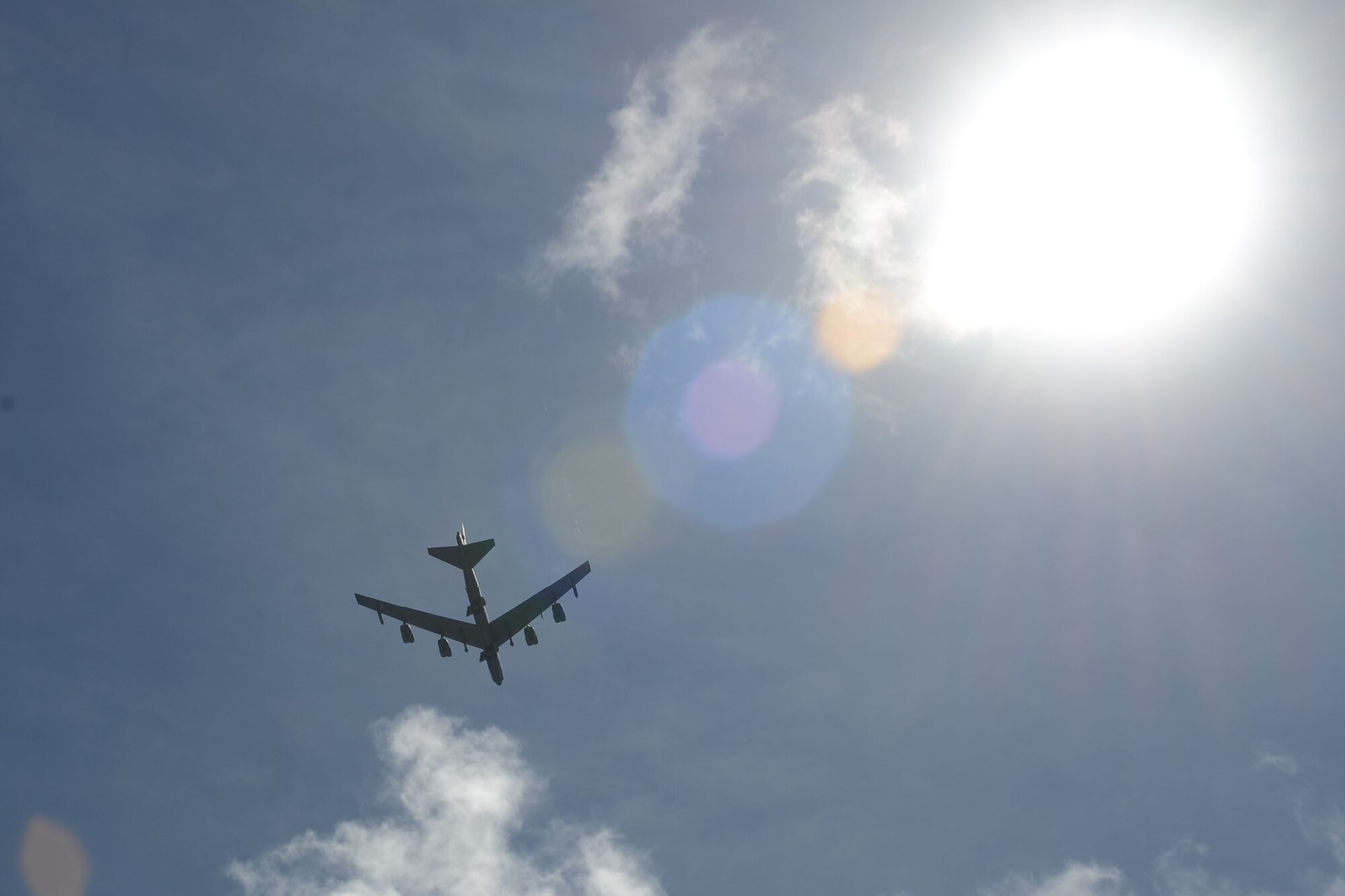U.S. Air Force aircrew members from the 20th Expeditionary Bomb Squadron fly a B-52 Stratofortress over Hagåtña, Guam, in the Liberation Day Parade, July 21, 2015. Liberation Day is celebrated in honor of the World War II Chamorro generation and to show gratitude to the U.S. for returning to rescue Guam as it suffered the atrocities of the Japanese occupation. (U.S. Air Force photo by Airman 1st Class Alexa Ann Henderson/Released)