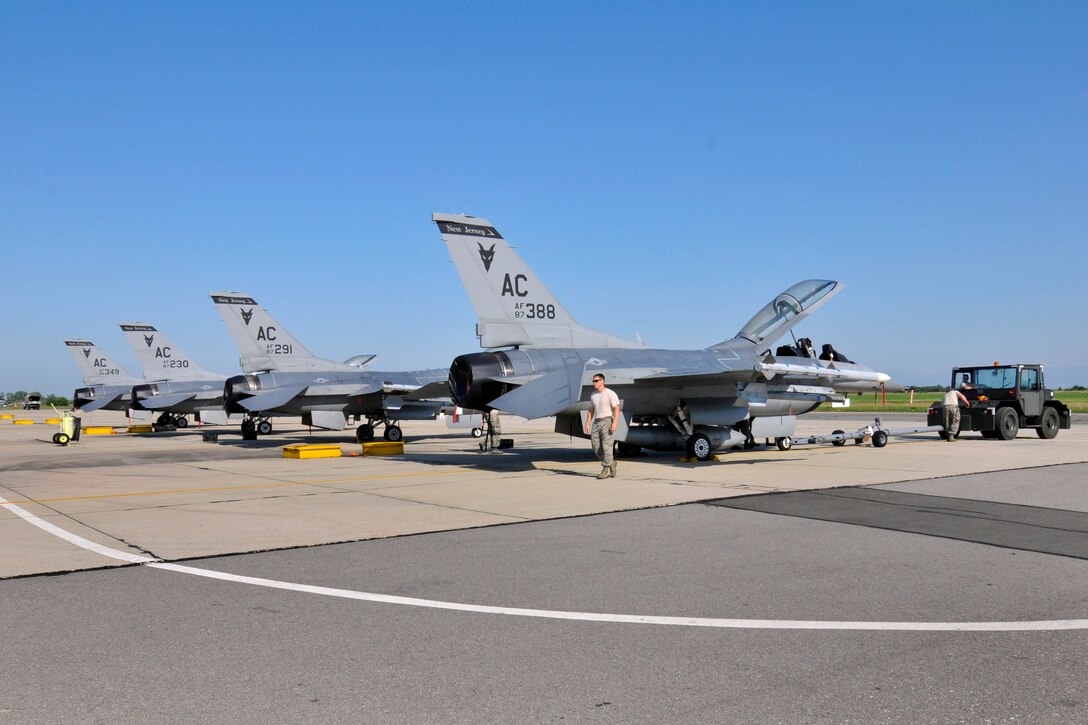 U.S. Air Force crew chiefs prepare F-16 Fighting Falcons during the exercise Thracian Star 2015 with the Bulgarian air force on Graf Ignatievo Air Base, Bulgaria, July 13, 2015.
