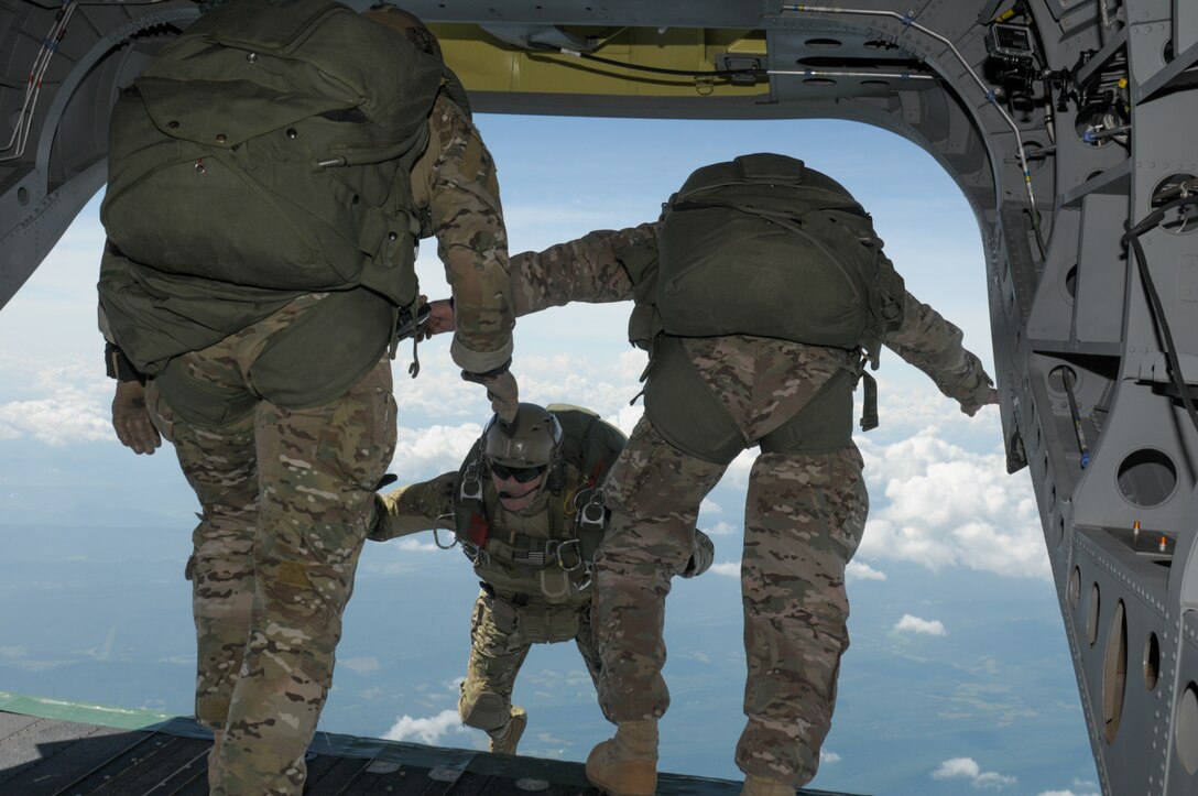 Soldiers free fall from 13,000 feet during a jump over Little Orleans, Md., July 18, 2015. The soldiers are assigned to the Maryland Army National Guard's Company C, 1st Squadron, 158th Cavalry Regiment.