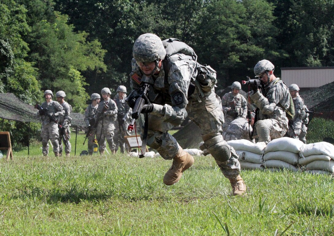 An Army cadet sprints during the buddy rush portion of the training for individual movement techniques on Fort Knox, Ky., July 16, 2015. 