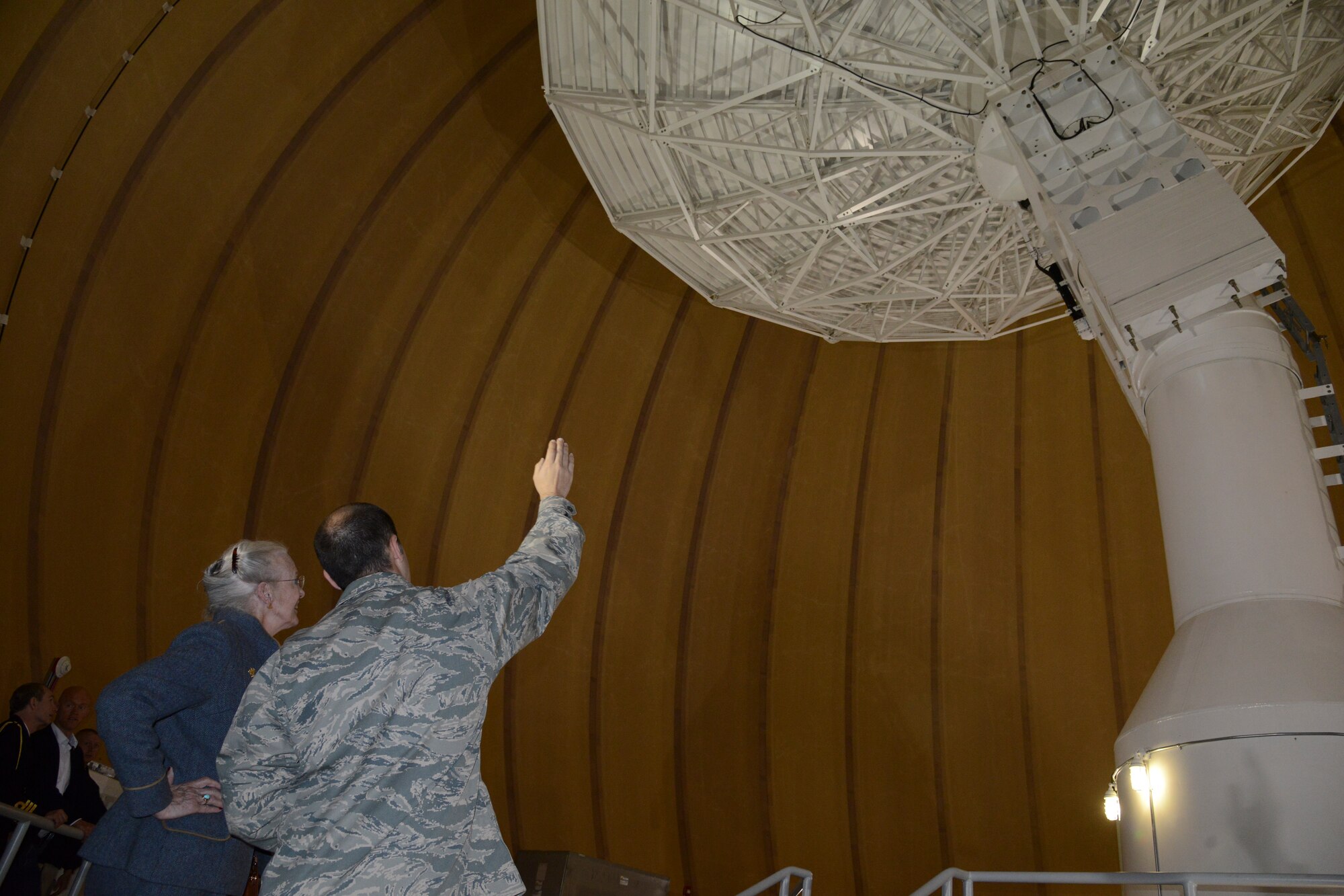 THULE AIR BASE, Greenland – Her Majesty The Queen of Denmark Margrethe II, tours an antennae station at Detachment 1, 23rd Space Operations Squadron, as Capt. Theodore Givler, Det. 1, 23rd SOPS commander, explains how the equipment works July 11, 2015. The queen visited Thule as part of her annual visit to Greenland. (U.S. Air Force photo by Tech. Sgt. Jared Marquis)