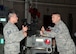 On his recent tour of the Missouri Air National Guard’s 131st Bomb Wing at Whiteman Air Force Base, Missouri State Command Chief Master Sgt. Joe Sluder (right) visits the weapons load trainer dock.  There he is briefed on B-2 weapons capabilities and operations by Tech. Sgt. Ricardo Zuniga, a 131st Maintenance Group weapons specialist. (U.S. Air National Guard photo by Airman 1st Class Halley Burgess)
