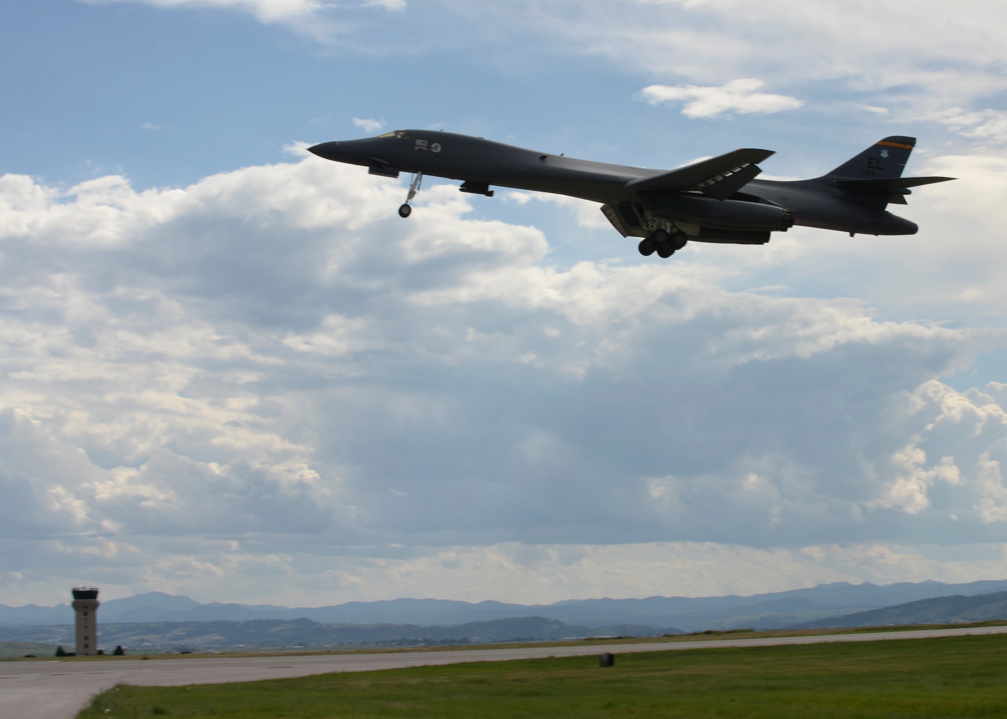 A B-1 bomber takes off at Ellsworth Air Force Base, S.D., July 20, 2015. As part of her tour, James took part in a B-1 bomber familiarization flight where she observed a close air support training mission. (U.S. Air Force photo by Senior Airman Anania Tekurio/Released)