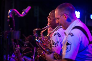 Tech. Sgt. Grant Langford, U.S. Air Force Band’s Airmen of Note tenor saxophonist, performs during the 24th Annual Greater Hartford Festival of Jazz July 19, 2015, at Bushnell Park in downtown Hartford, Conn. The saxophone section performed one song, Nodopity, separately during the concert to showcase the group’s flexibility to play within smaller groups within the band. (U.S. Air Force photo by Airman 1st Class Philip Bryant)