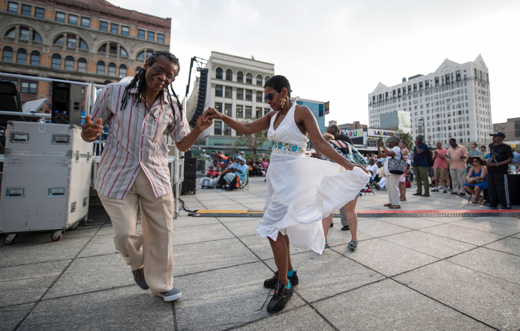 Two concert attendees dance to the music of the U.S. Air Force Band’s Airmen of Note in Harlem, New York City during the Jazzmobile’s Summerfest July 18, 2015. Harlem brought about a renaissance movement that included a resurgence of jazz to New York City during the 1920’s. The Airmen of Note and guest artists continued that resurgence by playing a free jazz concert in the heart of Harlem. (U.S. Air Force photo by Airman 1st Class Philip Bryant)