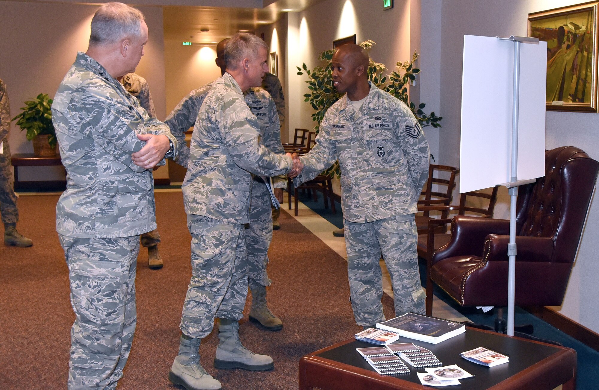 Maj. Gen. Jay Silveria, U.S. Air Force Warfare Center commander, is greeted by Technical Sgt. Aubrey Vasquez, 423d Mobility Training Squadron Force Protection research analyst, at the U.S. Air Force Expeditionary Center, July 15, 2015. General Silveria met with members of the USAFEC, 621st Contingency Response Wing and 57th Weapons Squadron during his visit to Joint Base McGuire-Dix-Lakehurst, N.J. (U.S. Air Force photo by Brad Camara)