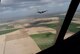 Two 302nd Airlift Wing C-130s conduct formation flying training over
Poland's countryside April 13, 2015 as part of joint exercises in Poland.  The 302nd AW assigned reservists and C-130s joined U.S. Air Force members permanently assigned to the U.S. Air Force's Aviation Detachment in Poland as well as two C-130s from Ramstein's 37th Airlift Squadron to conduct bilateral training with the Polish Air Force (PLAF) March 23 to April 17, 2015. (U.S. Air Force photo//Lt. Col. Ryan Tanton)

