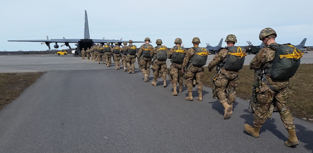 U.S. Army paratroopers board a 302nd Airlift Wing C-130 in the Republic of
Estonia in preparation for personnel drops during joint training exercises April 10,
2015. The 302nd AW assigned reservists and two C-130s joined U.S. Air Force
members permanently assigned to the U.S. Air Force's Aviation Detachment in
Poland as well as two C-130s from Ramstein's 37th Airlift Squadron to
conduct bilateral training with the Polish Air Force (PLAF) March 23 to
April 17, 2015.  (U.S. Air Force photo//Lt. Col. Ryan Tanton)
