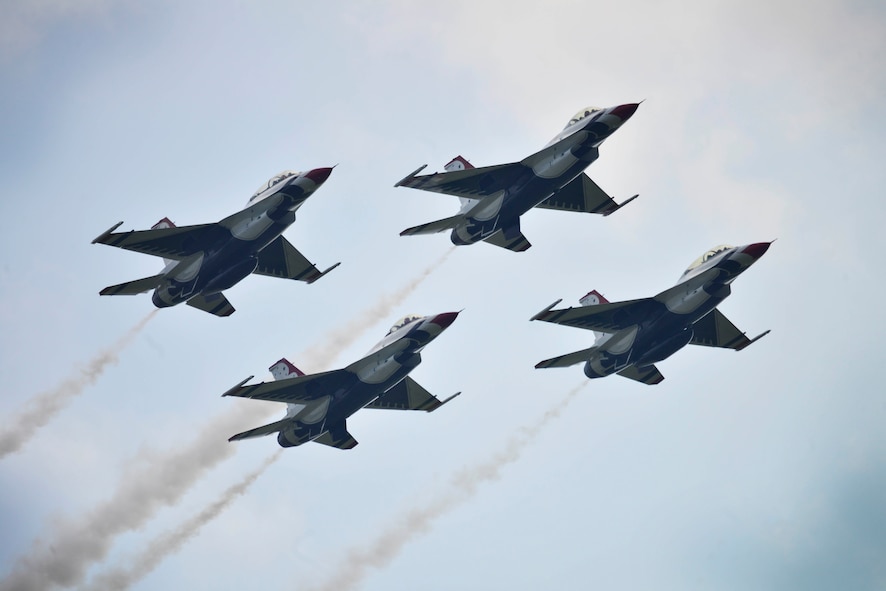 The U.S. Air Force Thunderbirds fly in formation over Niagara Falls Air Reserve Station, N.Y. during the Thunder of Niagara air show, July 18, 2015. (U.S. Air Force photo by Tech. Sgt. Stephanie Sawyer) 