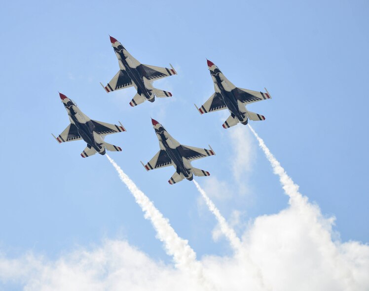 The U.S. Air Force Thunderbirds fly in formation over Niagara Falls Air Reserve Station, N.Y. during the Thunder of Niagara air show, July 18, 2015. (U.S. Air Force photo by Tech. Sgt. Stephanie Sawyer) 