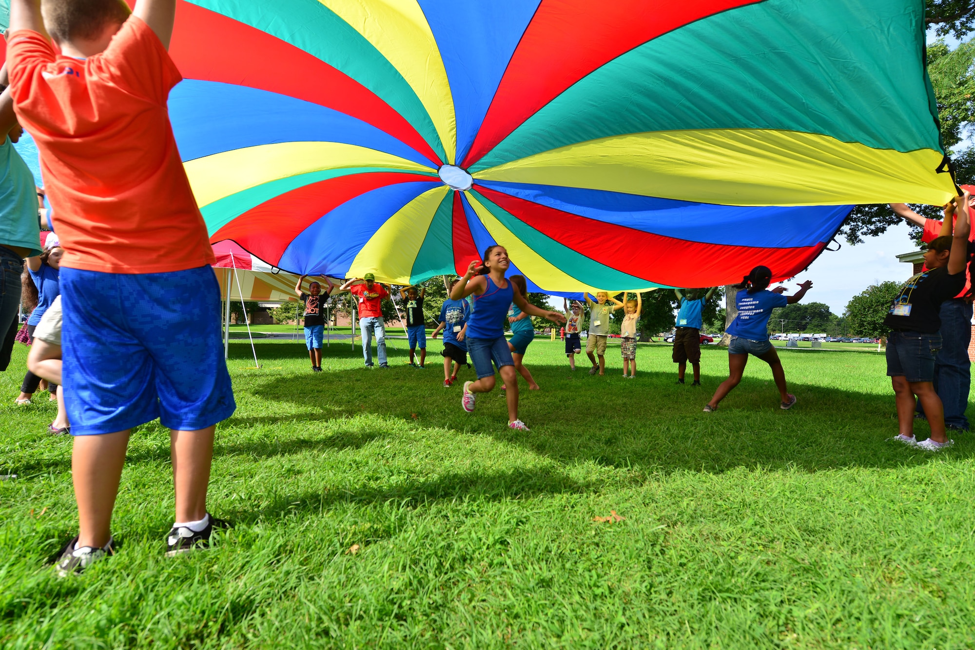 Regimental Chapel Vacation Bible School students play games at the chapel on Fort Eustis, Va., July 14, 2015. Children rotated through team work games as well as crafts and studies, all of which exemplified the week’s lessons and working together. (U.S. Air Force photo Staff Sgt. Natasha Stannard/Released)

