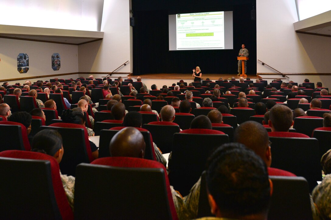 U.S. Army Maj. Winston Evison, U.S. Army Human Resources Command officer in charge, reviews the noncommissioned officer rating system during an NCO evaluation report training session at Fort Eustis, Va., July 15, 2015. Key objectives of the training included helping Soldiers and supervisors understand the new NCOER forms, evaluation policy updates, how to maintain and forecast senior rater profiles, and the use of the Entry Evaluation System, or EES, which will capture the changes. (U.S. Air Force photo by Staff Sgt. Natasha Stannard/Released)