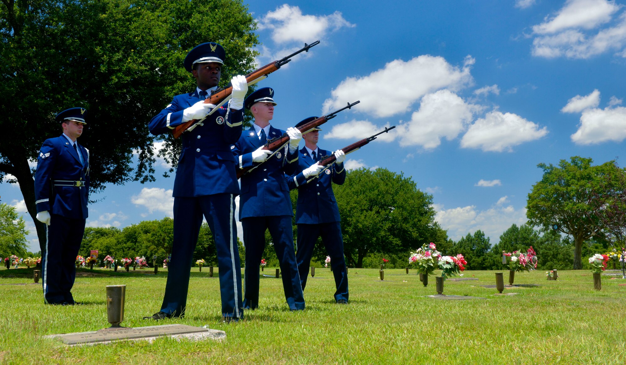 Honor Guardsmen from Barksdale Air Force Base perform a Three-volley salute during a funeral in Bossier City, La., July 27, 2015. The three-volley salute is a tradition which dates back to the European dynastic wars, where fighting ceased to collect the dead, and three shots were fired which signaled the battle could resume. (U.S. Air Force photo/Airman 1st Class Mozer O. Da Cunha)