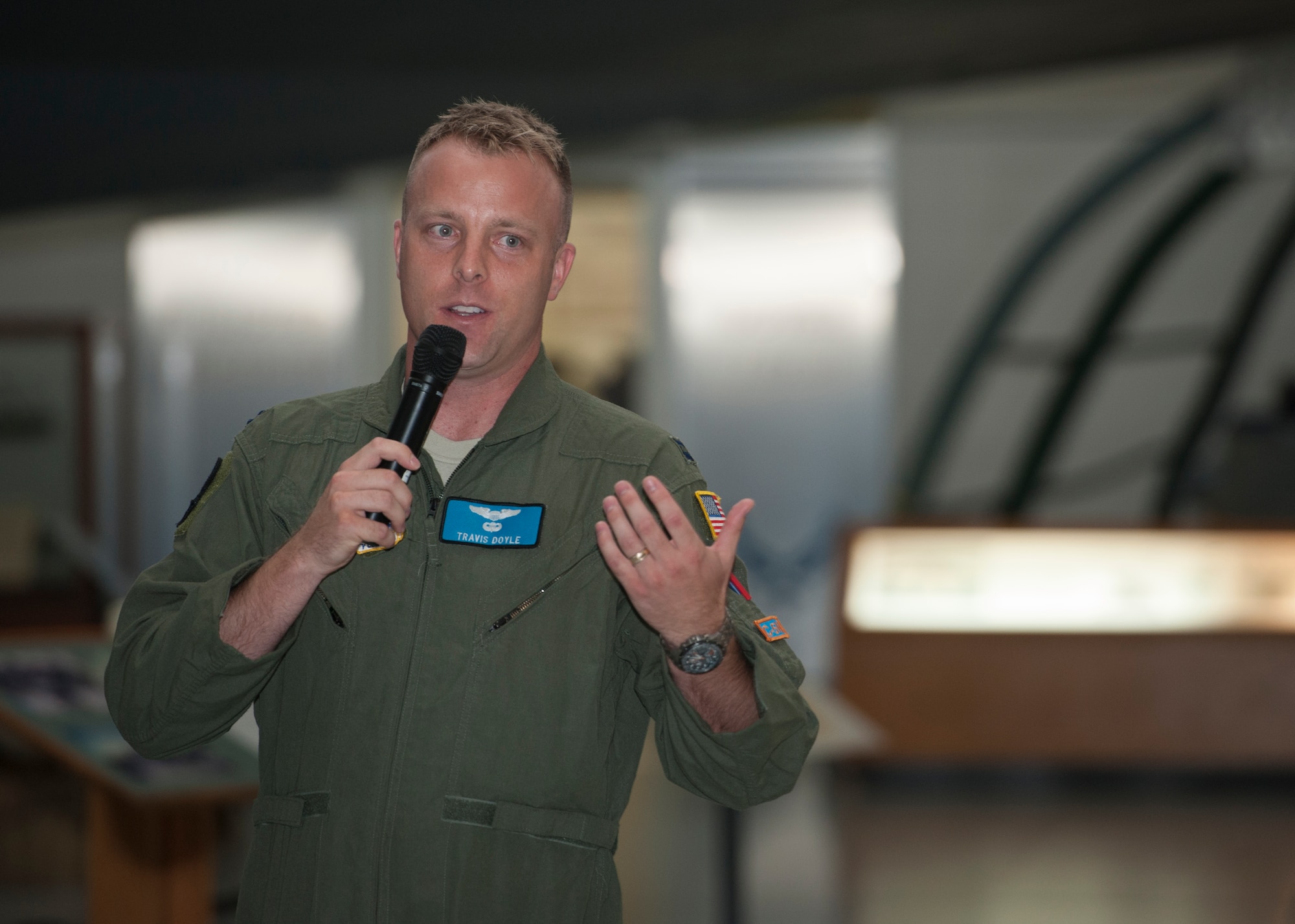 Capt. Travis Doyle, 9th Airlift Squadron C-5M Super Galaxy pilot, gives a presentation entitled, “The Air Force and Airplane Fundamentals,” to an audience July 19, 2015, at the Air Mobility Command Museum on Dover Air Force Base, Del. This presentation is part of the museum’s continuing series of “Hangar Flying.” (U.S. Air Force photo/Airman 1st Class Zachary Cacicia)