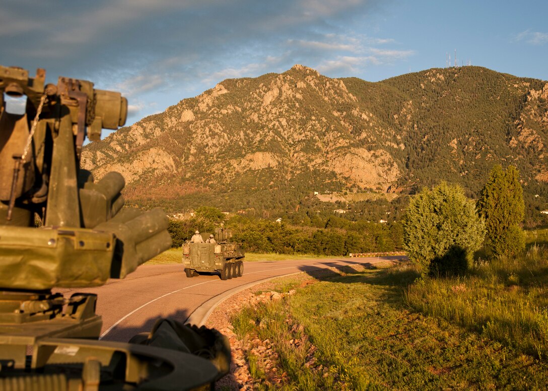 CHEYENNE MOUNTAIN AIR FORCE STATION, Colo. – Soldiers from the 4th Infantry Division, 1st Stryker Brigade Combat Team respond to a blocking exercise at Cheyenne Mountain Air Force Station, July 15, 2015. The 4th ID responded with Strykers and Humvees to simulate blocking key locations of approach to CMAFS as part of existing support agreements for future real world situations. (U.S. Air Force photo by Senior Airman Tiffany DeNault)