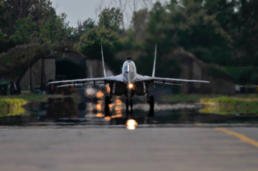 Two Bulgarian air force MiG-29 Fulcrums taxi to their parking spots at Graf Ignatievo Air Base, Bulgaria, during Thracian Star on July 15, 2015. Airmen and F-16s from the 177th Fighter Wing of the New Jersey Air National Guard flew sorties with the Bulgarian air force at Thracian Star, a bilateral training exercise designed to enhance interoperability. (U.S. Air National Guard photo by Master Sgt. Andrew J. Moseley/Released)