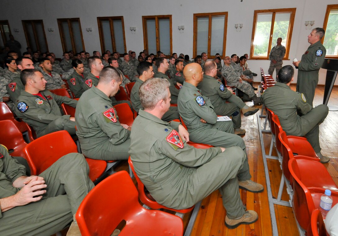 U.S. Air Force Airmen from the 177th Fighter Wing of the New Jersey Air National Guard are briefed by Lt. Col. Timothy Hassel, 119th Fighter Squadron commander, during Thracian Star, a bilateral training exercise to enhance interoperability with the Bulgarian air force at Graf Ignatievo Air Base, Bulgaria, on July 10, 2015. (U.S. Air National Guard photo by Master Sgt. Andrew J. Moseley/Released)