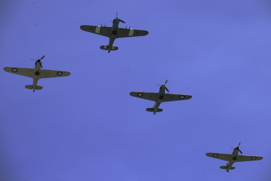 Honoring the 75th anniversary of the Battle of Britain, approximately 12 vintage warbirds, to include a Bristol Blenheim and several Supermarine Spitfires and Hawker Hurricanes, perform during the Royal International Air Tattoo in RAF Fairford, United Kingdom, July 18, 2015. Approximately 100,000 aviation fans enjoyed RIAT’s 30th year, where 250 aircrafts from 16 countries around the world participated. (U.S. Air Force photo by Tech. Sgt. Chrissy Best/Released)