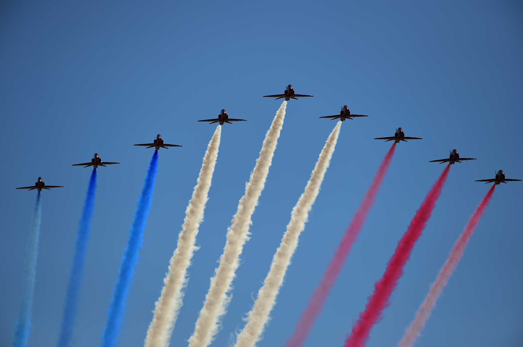 The Royal Air Force Red Arrows aerobatic team performs during the Royal International Air Tattoo in RAF Fairford, United Kingdom, July 19, 2015. The Red Arrows, established in 1965, have performed approximately 4,500 public displays. (U.S. Air Force photo by Tech. Sgt. Chrissy Best/Released)