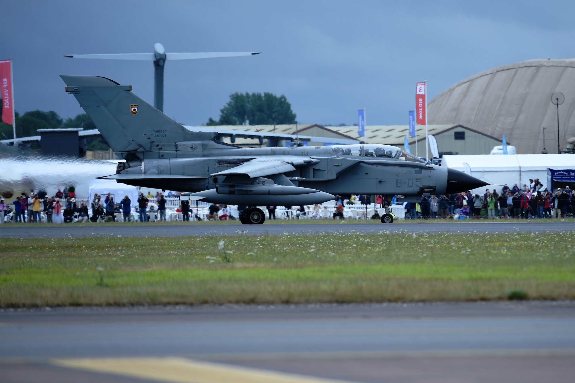 A Polish Air Force MiG-29 “Fulcrum” rockets down the flightline during the Royal International Air Tattoo at RAF Fairford, United Kingdom, July 17, 2015. Initially flown in 1977, the Fulcrum on display at RIAT comes from the 23rd Tactical Air Base at Mińsk Mazowiecki in eastern Poland. (U.S. Air Force photo by Staff Sgt. Jarad A. Denton/Released)