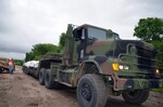 Soldiers with the North Dakota National Guard wait for their sandbag-loaded
truck to be unloaded in Burlington, N.D., June 21, 2011. The U.S. Army Corps
of Engineers, St. Paul District, and the National Guard, are currently
raising temporary emergency levees in the city. The Corps' number one
priority is protecting human life and will continue to provide technical
assistance to local communities affected by historic flooding along the
Souris River.